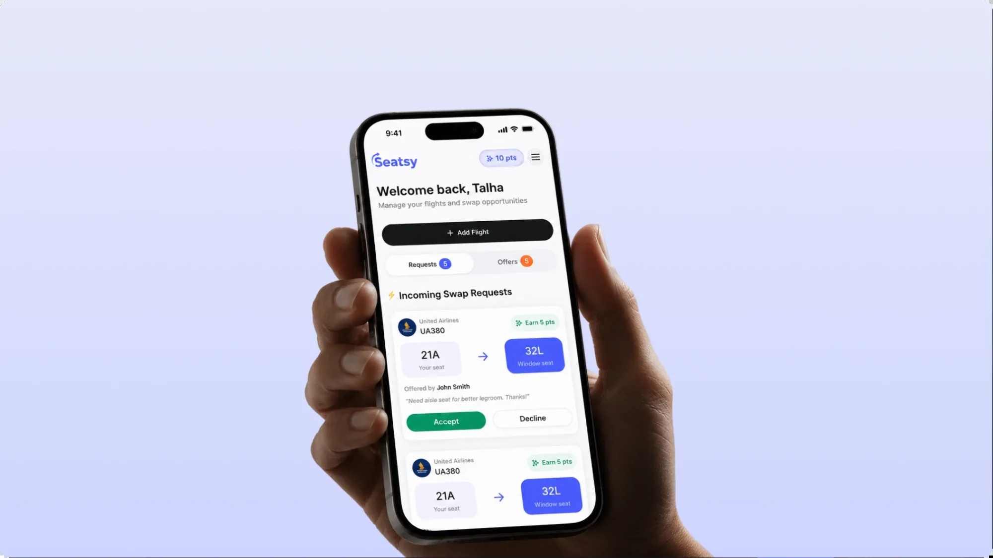 Seatsy mobile app in hand, showing incoming seat swap requests